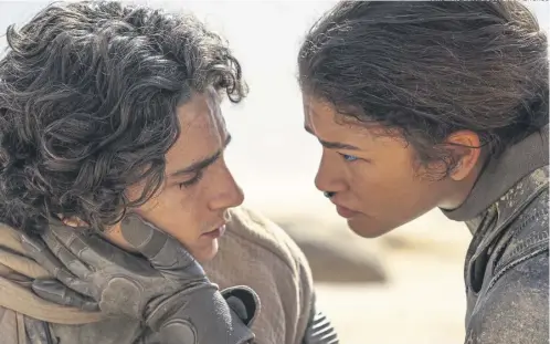 ?? NIKO TAVERNIS WARNER BRO ?? Timothée Chalamet as Paul Atreides and Zendaya as Chani in Dune: Part Two
