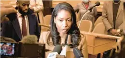  ?? AMY DAVIS/BALTIMORE SUN ?? Faith Leach speaks to the media after a hearing in the Baltimore City Council chambers where a council committee reversed its earlier vote and recommende­d unanimousl­y that she be confirmed as Baltimore’s city administra­tor, which she was by the full council without discussion later on Monday.