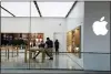  ?? LYNNE SLADKY - THE AP ?? In this March 14 file photo, Apple employees work inside a closed Apple store in Miami.