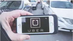  ?? RYAN REMIORZ / THE CANADIAN PRESS ?? San Francisco-based Uber has long argued drivers and couriers are independen­t contractor­s rather than employees.