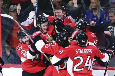  ?? SEAN KILPATRICK/THE CANADIAN PRESS ?? After Kyle Turris’s overtime goal against the Rangers, the Ottawa Senators are one win from reaching the conference final for the first time in 10 years.