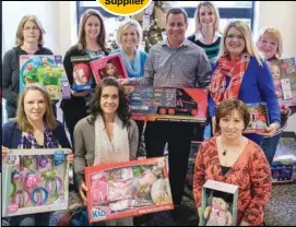  ??  ?? #2 Overall #1 Supplier Employees at CQuence Health Group donated more than 100 toys for the Salvation Army’s holiday drive.