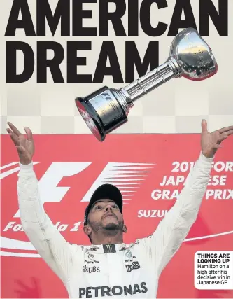  ??  ?? THINGS ARE LOOKING UP Hamilton on a high after his decisive win in Japanese GP