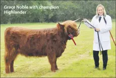  ??  ?? Grace Noble with champion Highlander