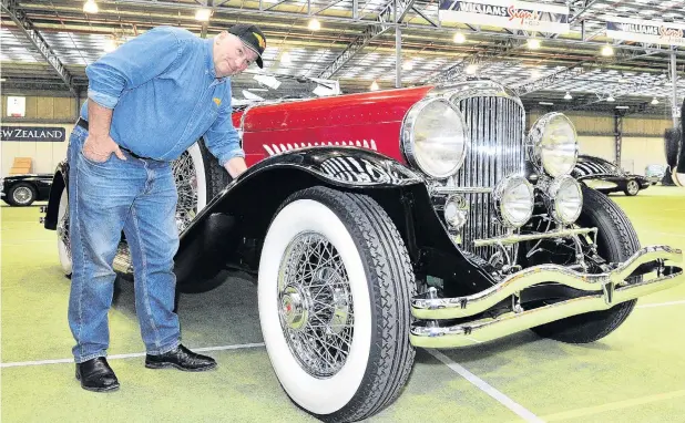 ?? PHOTO: ODT FILES ?? What a beauty . . Robert Duncan polishes a Duesenberg at the Edgar Centre ahead of the Auto Spectacula­r in 2013.