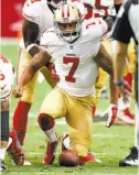  ?? Ross D. Franklin / Associated Press ?? Colin Kaepernick’s day included four intercepti­ons and two sacks.