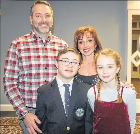  ?? JIM DAY/THE GUARDIAN ?? Ty MacLeod of Summerside is surrounded by parents Brian and Shelley and sister Tori. Ty, who turns 13 on Friday, is the 2019 Easter Seals Ambassador for P.E.I.