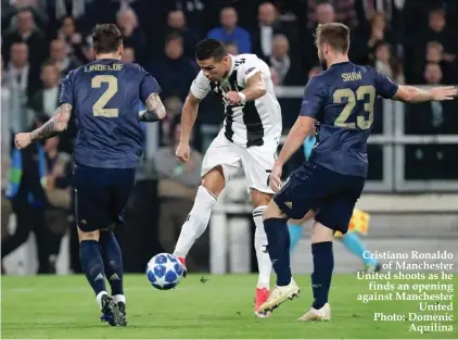  ??  ?? Cristiano Ronaldo of Manchester United shoots as he finds an opening against Manchester United Photo: Domenic Aquilina