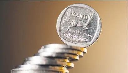  ?? Picture: Bloomberg ?? UNDER PRESSURE. The rand breached the R19 mark against the greenback in morning trade on Wednesday.