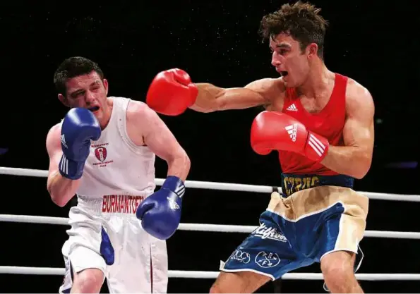  ?? Photo: ACTION IMAGES/ ADAM HOLT ?? OLD RIVALS: Loftus and Pattinson [right] box in the ABA final.
Now both are on the GB squad