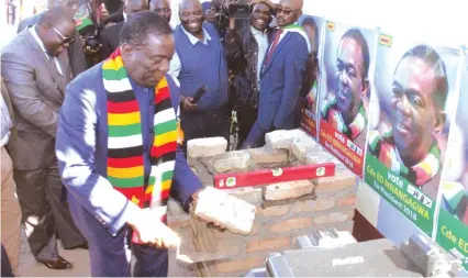  ?? Picture by Tinai Nyadzayo. ?? President Mnangagwa lays bricks during the ground-breaking ceremony of the 16 000 seater St Noah Sports Centre in Marange on Wednesday.