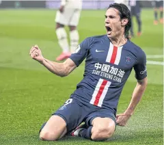  ?? AFP ?? Edinson Cavani celebrates scoring his 200th goal for PSG in February.