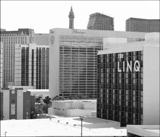  ?? JASON OGULNIK/LAS VEGAS REVIEW-JOURNAL ?? The Linq resort on the Strip was acquired by Caesars affiliates, partly funded by private equity firms, from the debt-burdened Caesars Entertainm­ent Operating Co.