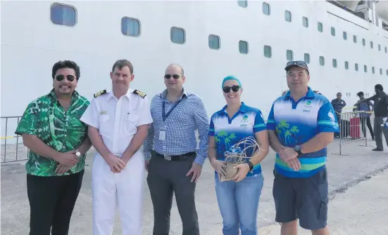  ?? Photo: PTI ?? From left: Mona Mato, Export Services Manager, Pacific Trade Investment Australia, Captain Pacific Jewel, Jeremey Goodman Director of Supply Chain, Carnival Australia and Azure Pure Water owners, Yael Sakker and Shaun Gilchrist