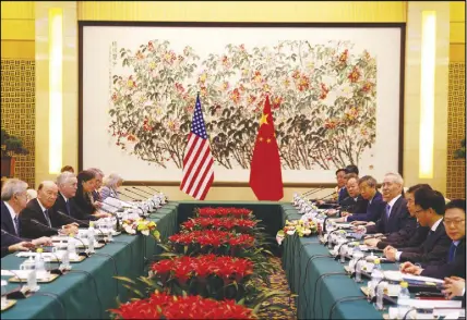  ?? AP PHOTO ?? U.S. Commerce Secretary Wilbur Ross, second from left, and Chinese Vice Premier Liu He, fourth right, attend a meeting at the Diaoyutai State Guesthouse in Beijing.