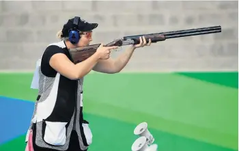  ??  ?? New Zealand gold medallist Natalie Rooney competes in the women’s trap shooting at the 2016 Rio Olympics.