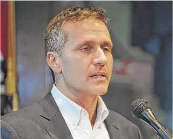  ?? JULIE SMITH/ THE JEFFERSON CITY NEWS- TRIBUNE VIAAP ?? Missouri Gov. Eric Greitens announces his resignatio­n Tuesday in Jefferson City, Missouri.