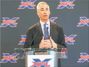  ?? Tribune News Service ?? XFL Commission­er and CEO Oliver Luck speaks during a news conference on March 5 at Raymond James Stadium in Tampa, Fla. Luck, along with others, spoke during the announceme­nt that Marc Trestman was named head coach of the Tampa Bay XFL team. Trestman is a former head coach in the NFL and CFL.