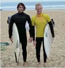  ?? ?? WAVE RIDERS: Victor Coetzee and Caleb Rogers relax after surfing in the semifinals of the Open on Saturday