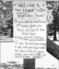  ?? Rita Greene/The Weekly Vista ?? An honor system sign at one of the vegetable stand Shane Jordan and his family operate.