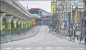  ?? PTI ?? MG Road in Bengaluru, a shopping hub, wears a deserted look on Sunday as the state imposes weekend curfews.