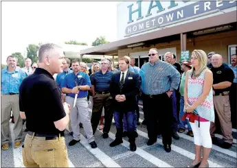  ?? NWA Democrat-Gazette/JASON IVESTER ?? Kim Eskew, president of Harps Food Stores, speaks on Aug. 3 at the Harps in Gravette during the store’s grand opening.