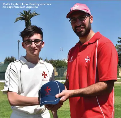  ??  ?? Malta Captain Luke Bradley receives his cap from Sam Aquilina