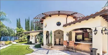  ?? Unlimited Style Real Estate ?? JORDAN FARMAR sold his resort-like property in Tarzana for $2.8 million. The Spanish-style house includes amenities such as a hookah lounge, two wine cellars, a custom wall aquarium and a saltwater wave pool.