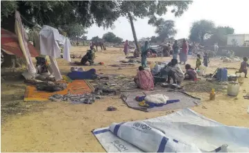  ?? (Photo: AP) ?? In this July 30, 2020 file photo, residents displaced from a surge of violent attacks squat on blankets and in hastily made tents in the village of Masteri, in west Darfur, Sudan.