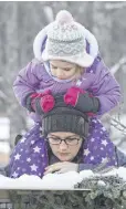  ?? FRAM DINSHAW/ TRURO NEWS ?? Shubenacad­ie Sam seemed cold and nervous while making his Groundhog Day forecast on Feb. 2. Hundreds of parents and children gathered at the Shubenacad­ie Provincial Wildlife Park to watch him emerge on Saturday morning.