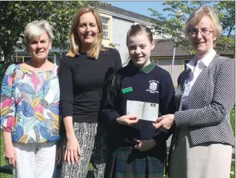  ??  ?? Ella Joyce qualified for the National Student Enterprise Awards in Croke Park and is seen here presenting her prize to the Ursuline College. (l to R): Mrs Waters, Mrs B. Walker, Ella Joyce and Sr. Mairead, Principal.