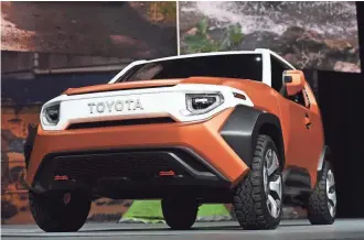  ?? GETTY IMAGES ?? Toyota is aiming the four-wheel-drive FT-4X crossover concept at young profession­als who “are fond of the outdoors but operate almost always indoors.”