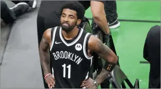  ?? ELISE AMENDOLA — THE ASSOCIATED PRESS ?? Kyrie Irving has reportedly exercised his $36.9million player option to remain with the Nets, although the team can still trade him.