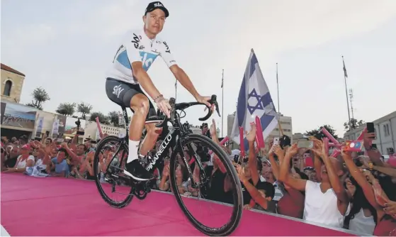  ??  ?? 2 Chris Froome of Team Sky is the centre of attention as he rides on to a stage during the team presentati­on for the Giro d’italia in Jerusalem, which hosts the start of the race today.