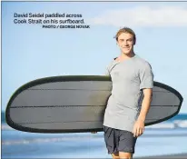  ?? PHOTO / GEORGE NOVAK ?? David Seidel paddled across Cook Strait on his surfboard.