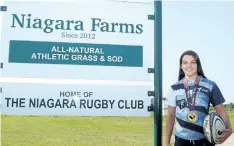  ?? DAVE JOHNSON/POSTMEDIA NEWS ?? Port Colborne's Kendra Cousineau stands in front of the Niagara Rugby Club in Thorold. The teen recently won a gold medal at Canadian Rugby Championsh­ips in Calgary playing for the Ontario Junior Blues U16 squad.