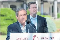  ?? ANDREW VAUGHAN/THE CANADIAN PRESS ?? David MacNaughto­n, left, and Brian Gallant attended the provincial premiers’ meeting in St. Andrews, N.B., on Thursday.