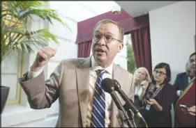  ?? AP PHOTO ?? Budget Director Mick Mulvaney speaks to reporters following a closed-door Republican strategy session that included Treasury Secretary Steven Mnuchin and Speaker of the House Paul Ryan, R-Wis., at the Capitol in Washington.