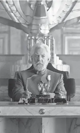  ?? MURRAY CLOSE/ AP ?? Donald Sutherland portrays President Snow in a scene from “The Hunger Games: Mockingjay — Part 1.”