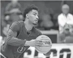  ?? BOB DONNAN/USA TODAY SPORTS ?? Michigan State guard Jaden Akins practices at Spectrum Center on Wednesday in Charlotte, N.C.