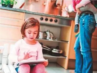  ??  ?? Parents have varied reasons for allowing screen time to children. While some do it so their kids are up to date with technology, others resort to it just to keep them engaged.