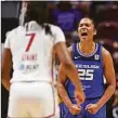  ?? Sean D. Elliot / Associated Press ?? Connecticu­t Sun forward Alyssa Thomas (25) celebrates after forcing a Mystics turnover in the fourth quarter Sunday.