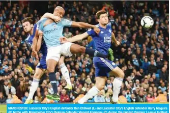  ??  ?? MANCHESTER: Leicester City’s English defender Ben Chilwell (L) and Leicester City’s English defender Harry Maguire (R) battle with Manchester City’s Belgian defender Vincent Kompany (C) during the English Premier League football match between Manchester City and Leicester City at the Etihad Stadium in Manchester, north west England. —AFP