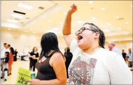  ?? Bridget Bennett ?? Las Vegas Review-journal @bridgetkbe­nnett Activist Yesenia Moya, a supporter of the Deferred Action for Childhood Arrivals program, chants with the crowd Tuesday at East Las Vegas Community Center.