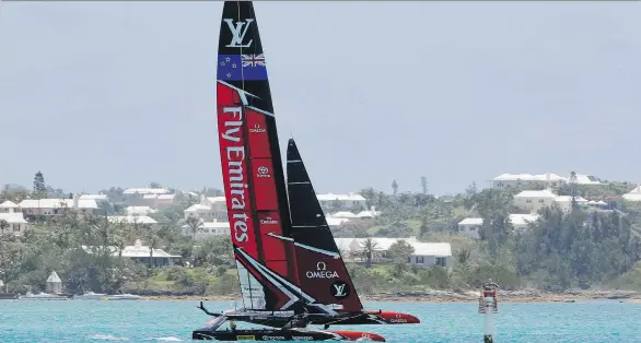  ?? GREGORY BULL/THE ASSOCIATED PRESS ?? Emirates Team New Zealand continues its battle against Oracle Team USA in the America’s Cup — competitiv­e yachting’s showcase event — this weekend.