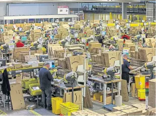  ?? Picture: Steve Brown. ?? Inside the warehouse facility in Dunfermlin­e.