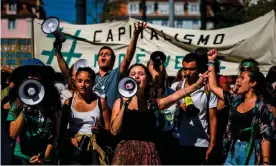  ?? Photograph: Patrícia de Melo Moreira/AFP/Getty Images ?? Demonstrat­ors in Lisbon on Friday, part of a global climate strike joined by an estimated 2 million people worldwide.