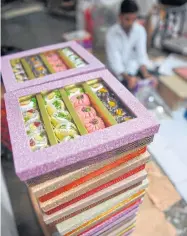  ?? AFP ?? Stacks of gift boxes of sweets are seen at a factory in Mumbai ahead of the Hindu festival Diwali, which falls on Sunday.