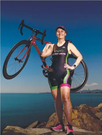  ?? Picture: EVAN MORGAN ?? BIG BOOST: Townsville triathlete Joanne Fairbrothe­r on the Strand.