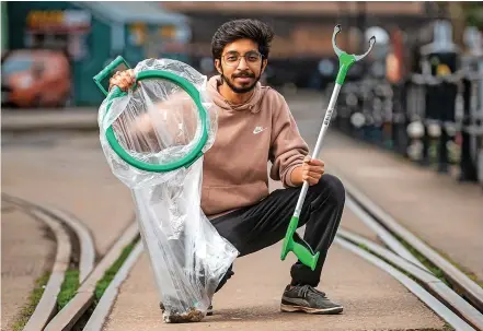  ?? Pictures: Adam Hughes/SWNS ?? Vivek Gurav is plogging – jogging and litter-picking – in 30 cities in 30 days to inspire others to get involved